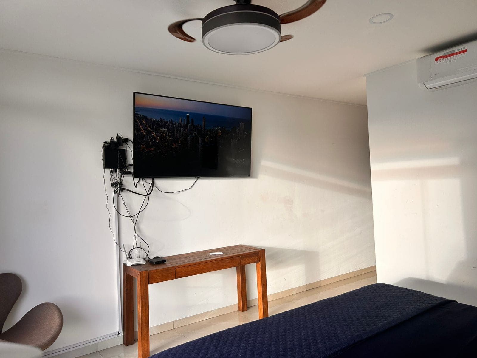 The master bedroom's seating and TV area