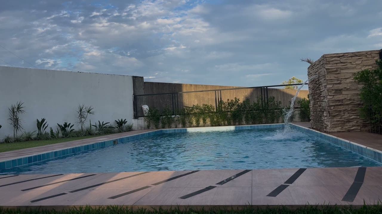 The pool waterfall at Davezies House with birdsong at golden hour